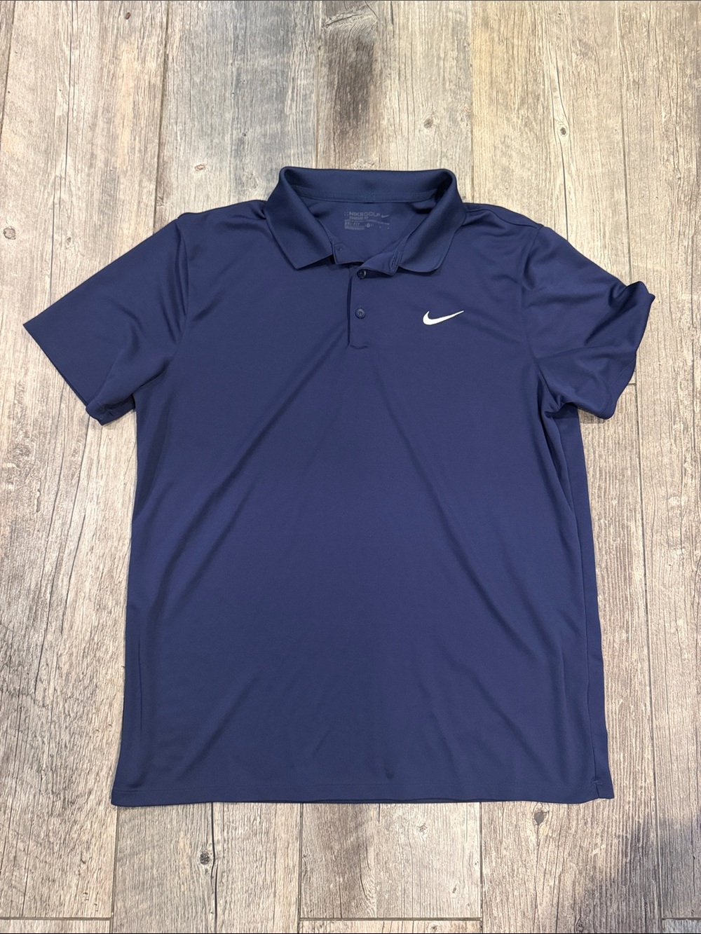 Nike Men’s Navy Polo with White Swoosh